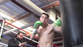 MICHAEL CONLAN WORKS ON THE HEAVY BAG IN PREPARATION OF TOP RANK DEBUT IN NEW YORK