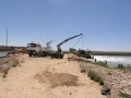 Lifting our haul boat over the wall between Lake Albert and Lake alexandrina at Narrung SA to commence extraction of 300 tonne o