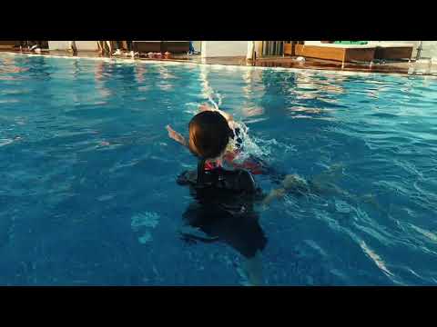 Bobby swimming in Ibis Hotel Vung Tau