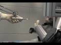 Monkey's brain controls robotic arm
