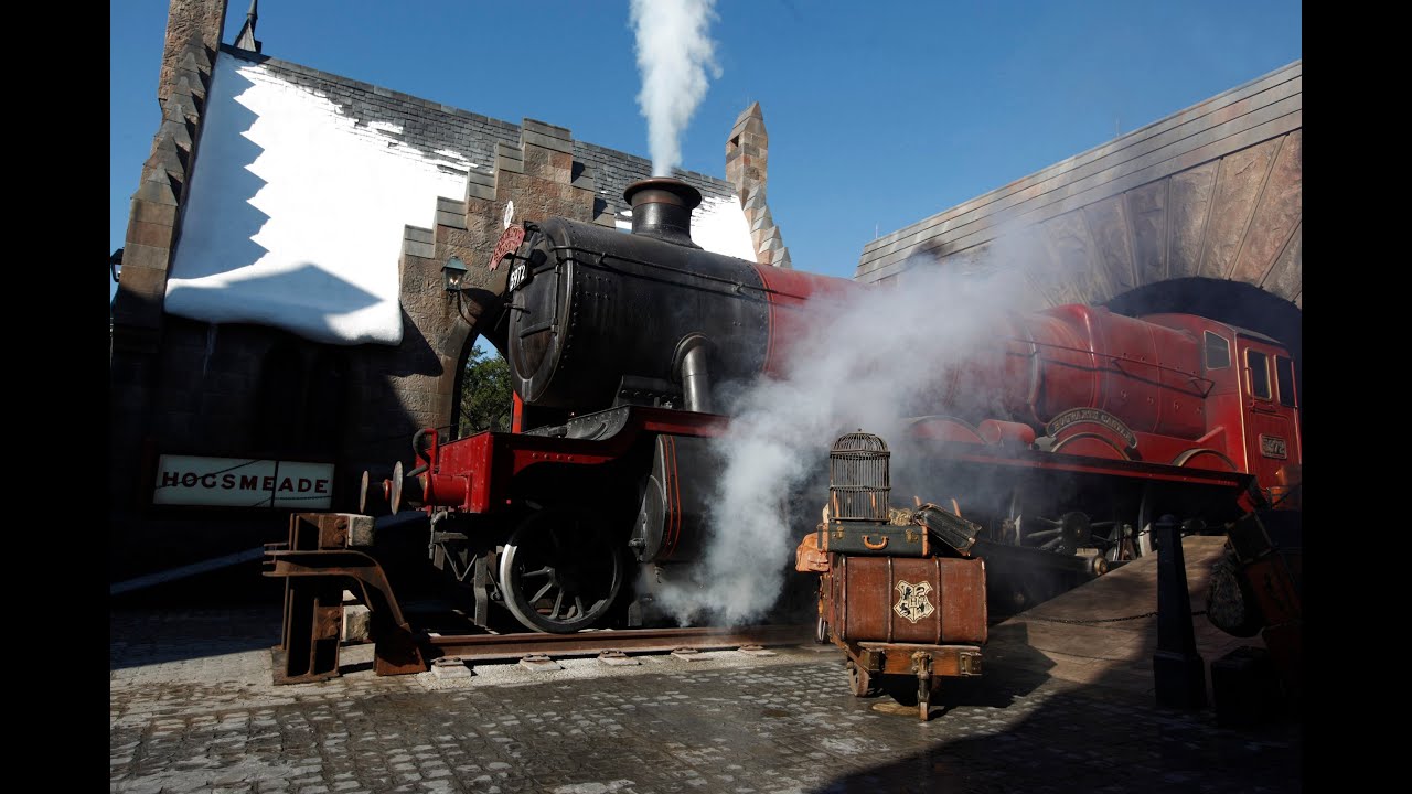 HOGWARTS EXPRESS Train Conductor making rounds - Wizarding World Of