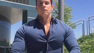 Flexing Muscles In The Street With A Tight Shirt. Pecs Bouncing