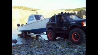 LR3 shorty Launching RC scale fishing boat on trailer.