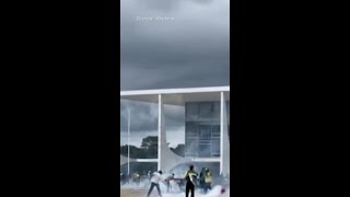 Brazilian Police Fire Tear Gas At Bolsonaro Supporters
