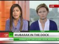 Mubarakused: Prone ex-pres caged for historic Egypt trial