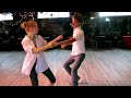 Tues Blues Denver Co teachers Ben Collins and Jessica Miltenberger dance together