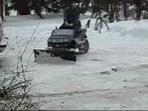 Riding lawnmower Power Wheels Garden tractor snow plow