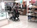 Cerebal Palsy drives standing in Permobil C400 power wheechair @KOHL's Mar2009 2of4