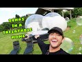 SLEEPING IN A INFLATABLE HOUSE!!! This was SO SCARY!!! (SOLO TRAVEL DIARIES)