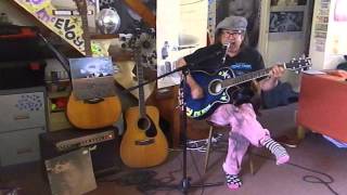 Watch John Lennon Tight A video