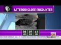Giant asteroid sails past Earth