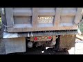 Tri-Axel Dump Truck Doing A Tailgate Spread For A Gravel Driveway