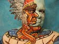 Native American Indian in a canoe! Face paint art in motion! Artist James Kuhn.