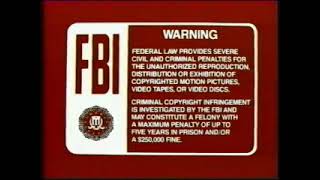 1986 Disney dark red FBI Warning screens and MCA Home  logo