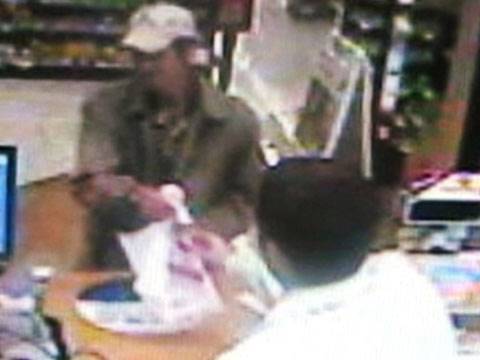 Surveillance footage of a pharmacy robbery at Walgreen's, 4899 NW Blitchton 