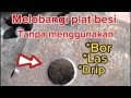 Cara melobangi plat besi, menggunakan palu..