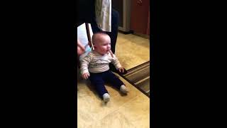 Baby meets puppy for the first time