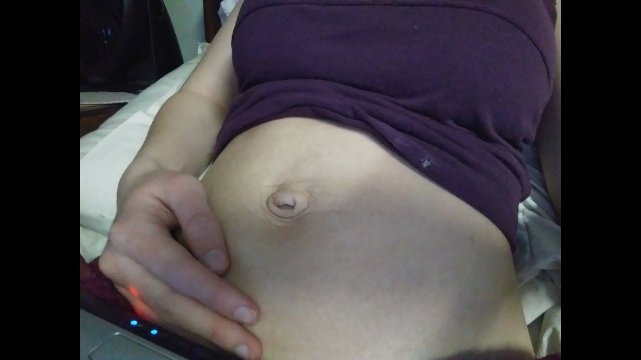 Nurse enjoys belly button play