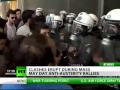 May Day Mayhem: Tear gas fired at Athens rally as pay cut protests rage on