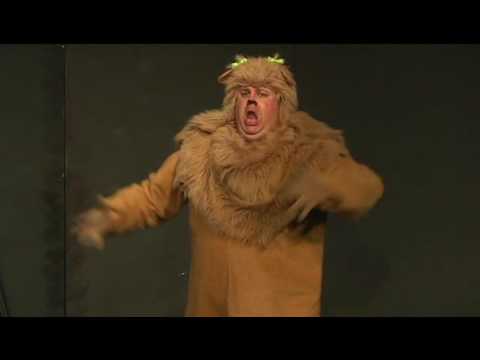 Adam Zangara as Cowardly Lion