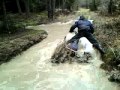 quad dans la boue