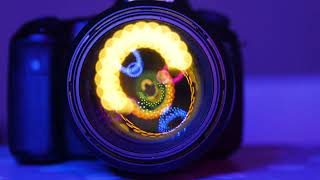 Dancing Lights Of Different Color Inside The Lens Of A Camera