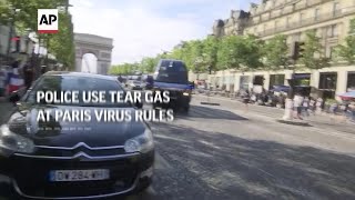 Police use tear gas at Paris virus rules protest