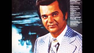 Watch Conway Twitty I Still See Him through The Hurt In Your Eyes video