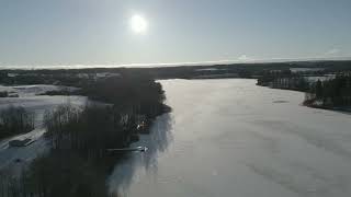 4K Drone Flight. Lithuanian Village In Winter. Background Relaxing Music Without Words.