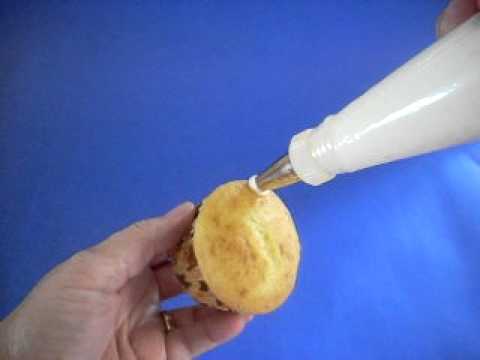 This video shows how to ice a cupcake using Wilton circle tip 12.