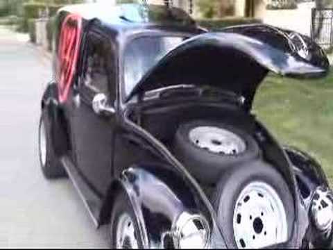 This is a modified 1973 Volkswagen Beetle The trunk has been converted into 