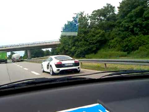 Audi R8 and Audi RS5 both white turning