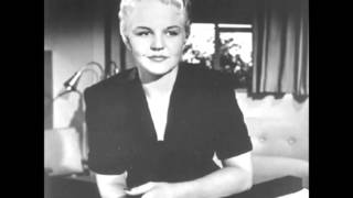 Watch Peggy Lee Sing A Rainbow video