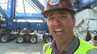 Global Rigging & Transport Unloading Container Crane
