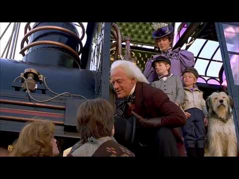 Creepy Kid from Back To The Future 3 points to his flux capacitor