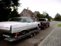 Chevy 2500HD truck tows Cadillac Sedan de Ville