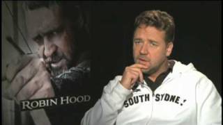 Russell Crowe laughs chatting about his Merry Men in Robin Hood