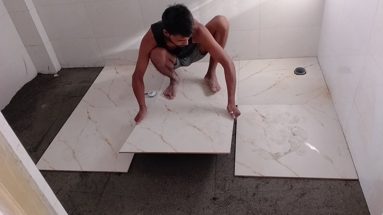 bathroom floor and wall tiles design / Bathroom floor tiles fitting working 2by2 ceramic tiles ...