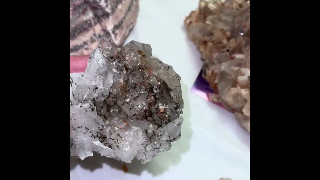Quartz cluster before and after using iron out to remove rust deposits ￼