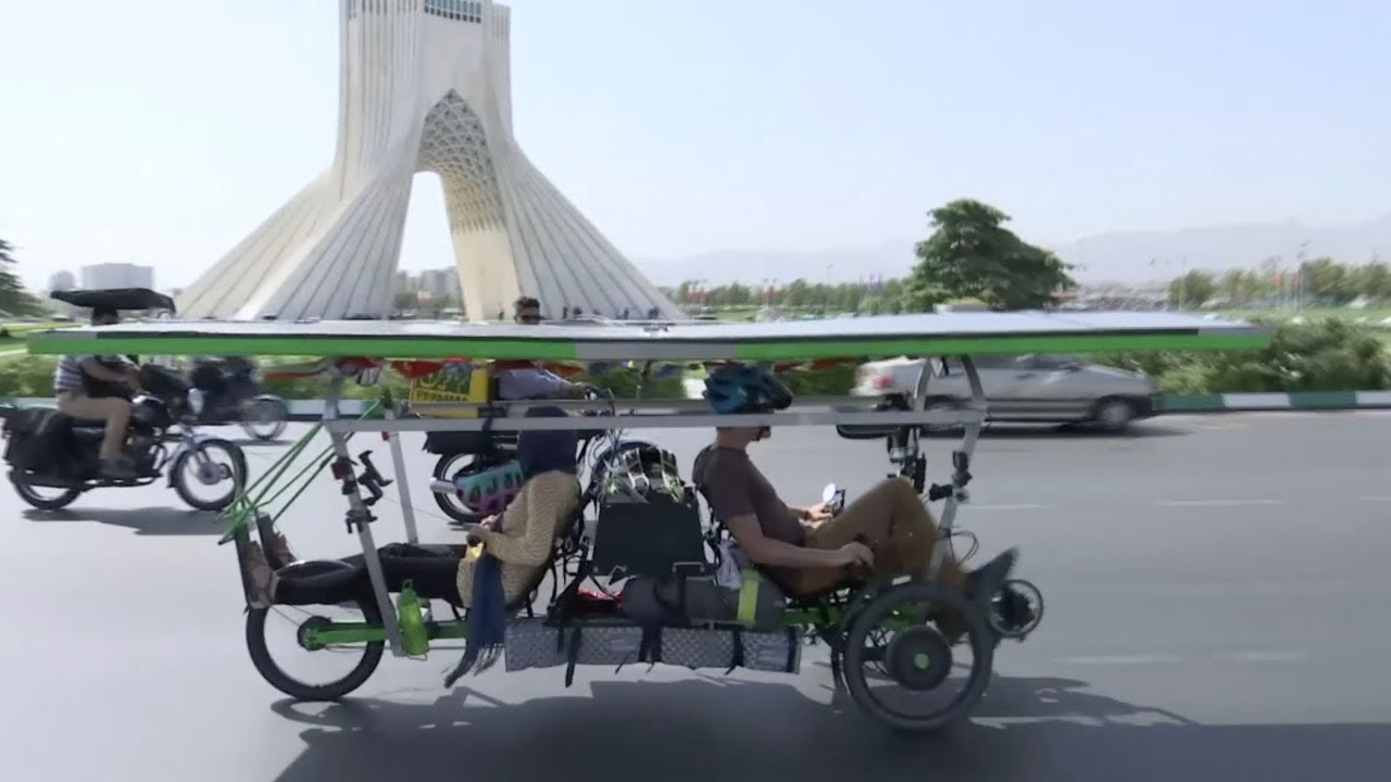 France to China solar bike cyclists attract attention in Tehran