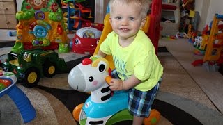 fisher price zebra ride on