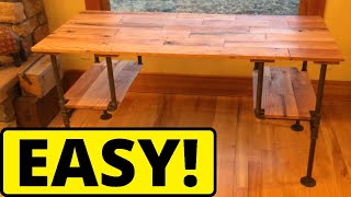 I built this easy DIY black iron pipe desk in less than 4 hours. It