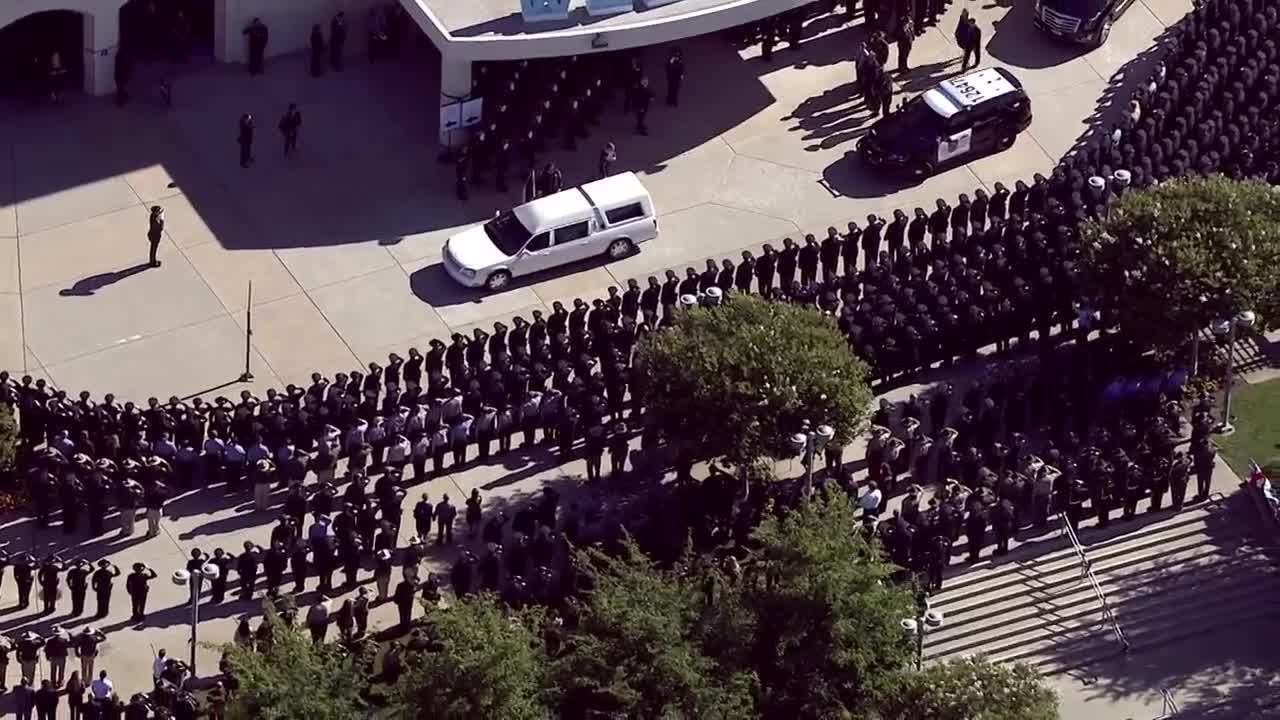 Officer Tara O'Sullivan's procession arrives at memorial service
