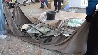 Residents in Ukrainian capital Kyiv clear debris and rebuild after deadly overnight Russian strike