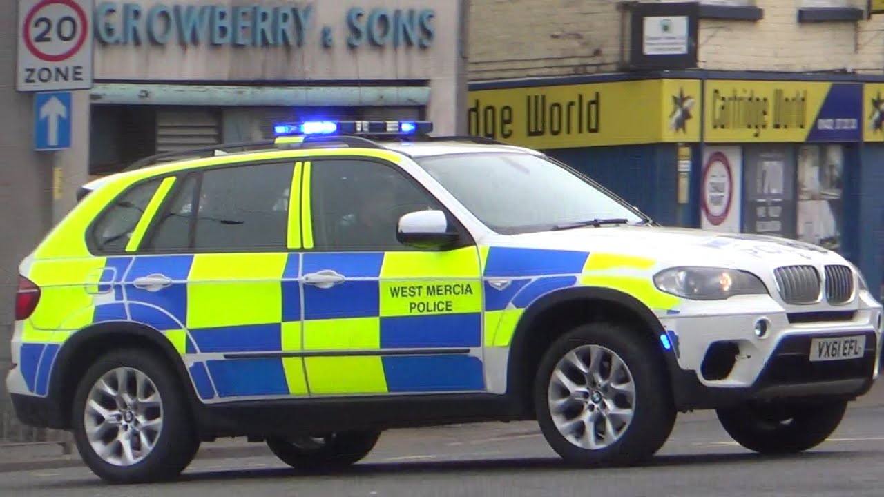Armed police car responding with siren and lights YouTube