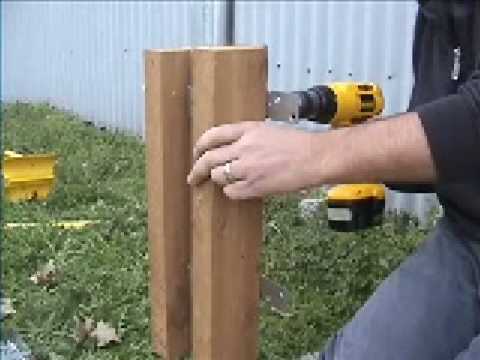 Wrapping steel posts with wood when building wood fence 