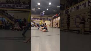 Girls in wrestling competition in High School gets slammed and lands awkwardly on leg