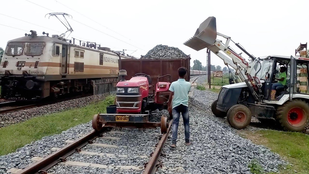 Cartoon Jcp Gadi Loading Stones On Mahindra Yuvo Tractor Jcp Tractor