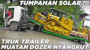 Tumpahan Minyak Solar Ditengah Jalan, Truk Trailer Pabrikan Tiongkok Nyangkut di Sitinjau Lauik