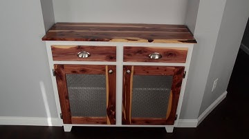 Custom bar cabinet and floating live edge shelves.
